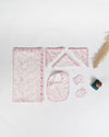 Top view Pink Feather newborn essential baby set